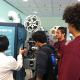Janel sharing about the projectors w/ the Pueo Program